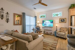 Open and airy living space. A large window so nature is always on display.