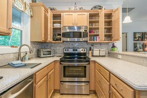 Well-equipped kitchen with all the appliances needed to whip up tasty meals.