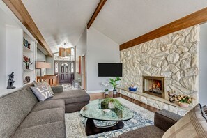 Come in and check out the gorgeous rock wall fireplace!