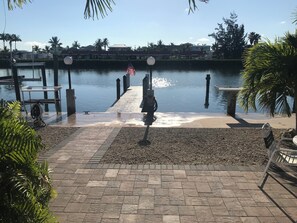 Canal side view of patio and villa. 40' dock on Key Colony Beach's largest canal