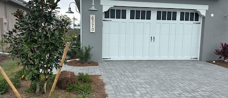 Front of House from street/sidewalk view.  Two car garage