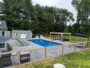 Use the Weber Gas Grill. Relax at the heated pool or play Cornhole in the large backyard.  Just past the pool and yard, take a relaxing walk on the "Meditation Meadow"  underneath October Mountain.