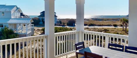 Enjoy the ocean views from the back deck with plenty of seating for a meal or just relaxing