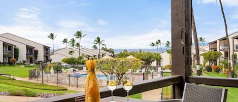 View from your lanai with the blue Pacific steps away.