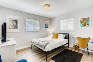Bedroom 2- its cozy, modern and ready for you!