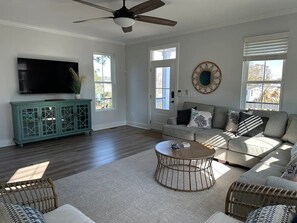 Enjoy the sun pouring into the spacious living room.