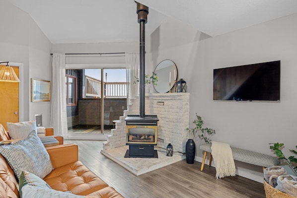 Cozy living room with gas fireplace and smart TV