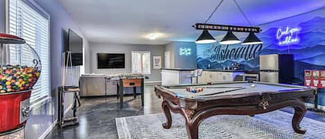 Billiards, Indoor Bar,  Shuffleboard, Fooseball, life size connect 4, and two 75" HDTV's in one entertainment area
