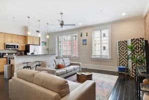 Welcome to our cozy living room! Enjoy a comfortable stay with ample seating.