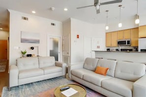 Welcome to our cozy living room! Enjoy a comfortable stay with ample seating.