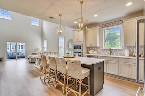 Kitchen Island, dining and living spaces.