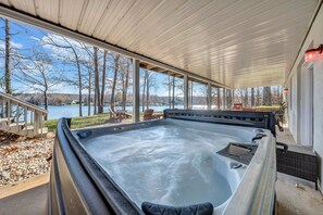 Relax and enjoy the view in a private hot tub.