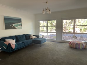 Living room 2, with stunning views to garden and golden elm tree.