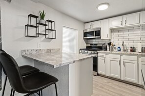 Fully remodeled and stocked kitchen with Gas stove.