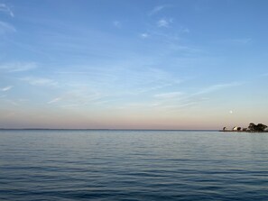 View of the moon over the bay