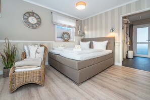 1-Zimmer-Appartement mit feststehendem Doppelbett