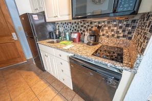 Kitchen Area with Dish Washer and FULL SIZED Fridge