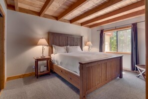 Bedroom 1: Master bedroom, king-size bed, large closet, en-suite bath, lower floor