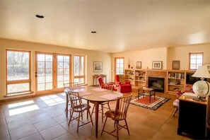 Large windows allow in plenty of natural light and a view overlooking the river