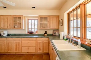 Spacious kitchen allows for plenty of storage and prep space