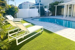 Soak Up the Warm Weather in Comfy Sun Loungers by the Pool(shared) & Enjoy Your Glowing Floridian Tan!