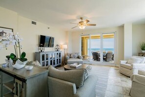 Den view opens to private balcony with seating for 6. 