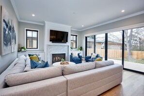 Main floor living room with an abundance of natural light