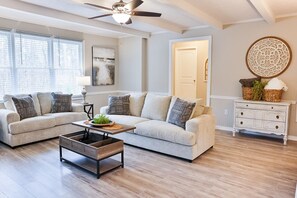 Lots of natural light in the roomy living room.