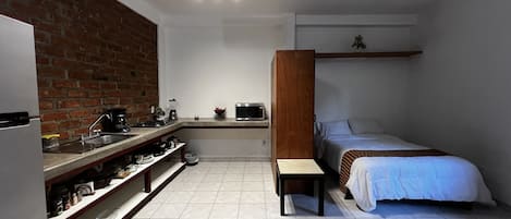 Studio type Apartment with a full kitchen.