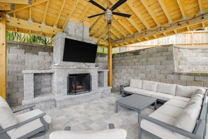 Watch the game or enjoy movie night with the family at the pool cabana.