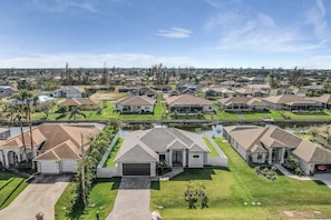 The backyard provides a picturesque view of the freshwater canal.