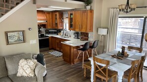 Main house dining area and kitchen. Seating for 8.