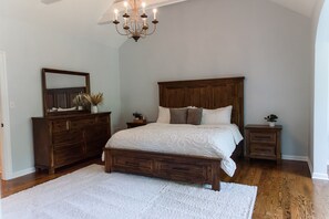 Master bedroom with attached bathroom and sitting area