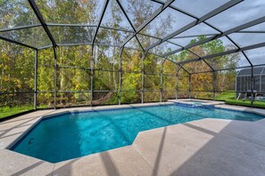 Semi private pool with lush conservation  view