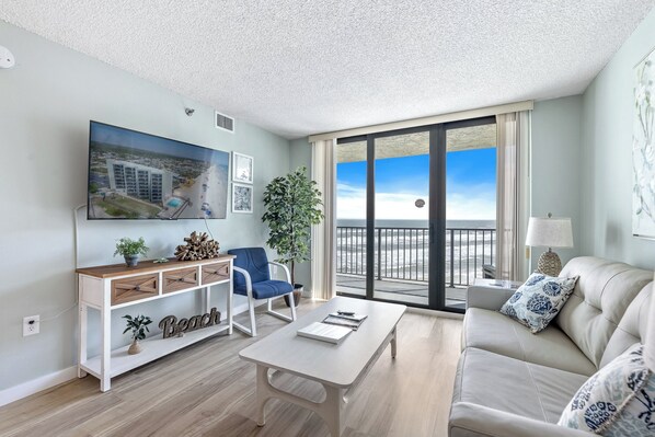 Spacious living room with balacony access