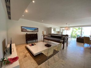 Spacious living area with plenty of seating, ideal for gathering and relaxing.