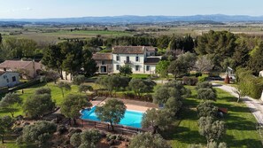 view of the property and pool