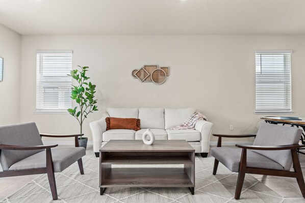 Main living room with 65" smart TV.