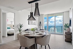 The main living and dining space looks out over the ocean