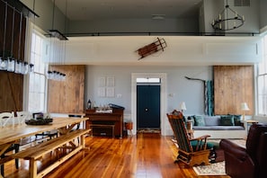 Looking back at the front door and the balcony overlooking the great room