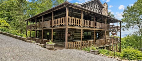 Huge three-floor log cabin.