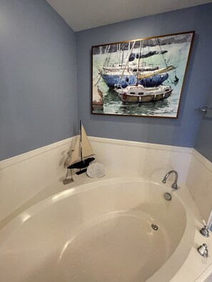 Primary Bedroom an-suite bathroom soaking tub. 