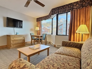 Living Room Area (pullout couch) with Great View of the Ski Resort | Listed with @BookTraverse
