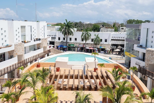 Aerial view showcasing the beautiful pool and complex location