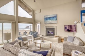 Living room with the view of the sea and boulders