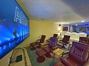 Home Theater: LG Ultra 4K 86" TV, Surround Sound system, reclining cinema chairs
