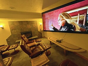 Enjoy a Massive 86" ULTRA 4K Television Home Theater with it's own Gas fireplace