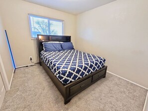 This comfortable bedroom is a perfect place to rest.