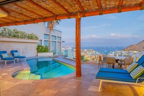 Lounge poolside with ocean view