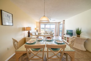Enjoy this beautiful open floor plan great room overlooking the pond with plenty of seating!